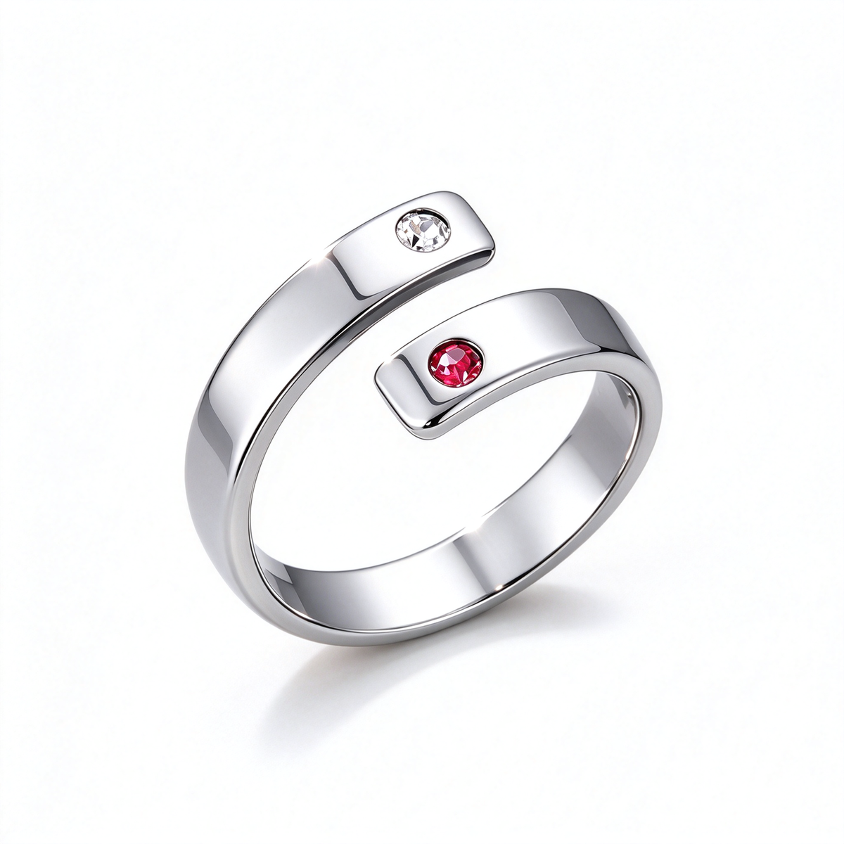 Gold-tone open ring with curved ends and two contrasting decorative accents.