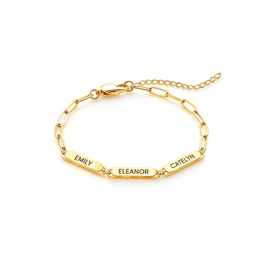 Gold-tone name bar bracelet shown alone from above, highlighting the linked name bars and extender chain.