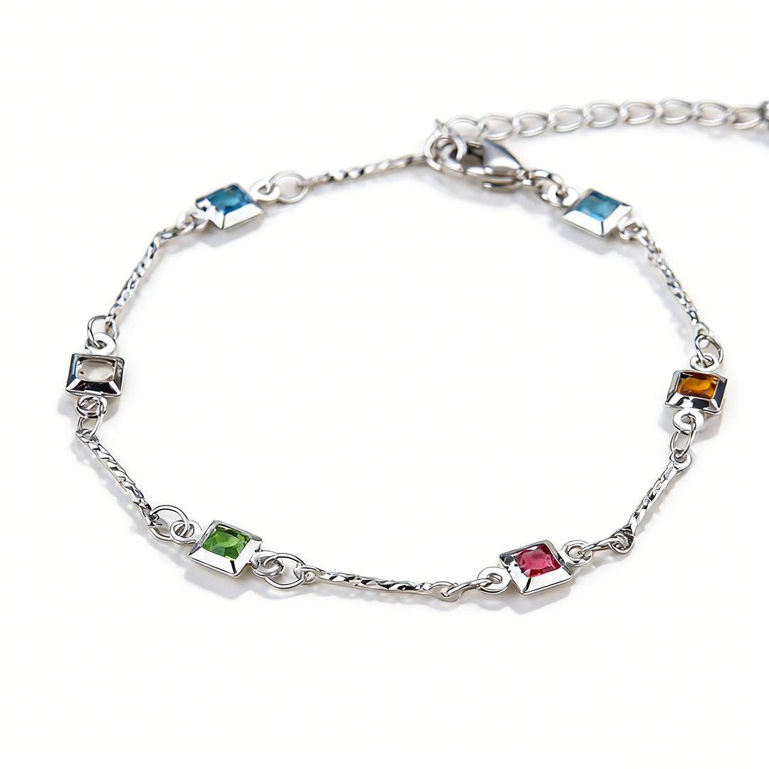 Close-up of a brilliant-cut CZ bracelet showcasing its high-shine platinum-look finish.
