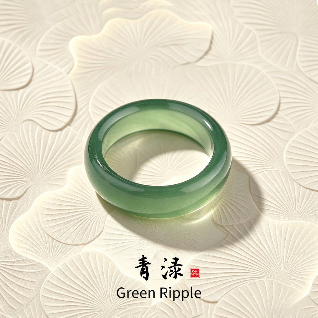 A full-length display of the Ever P. natural emerald green chalcedony ring, a minimalist and hypoallergenic gemstone band.