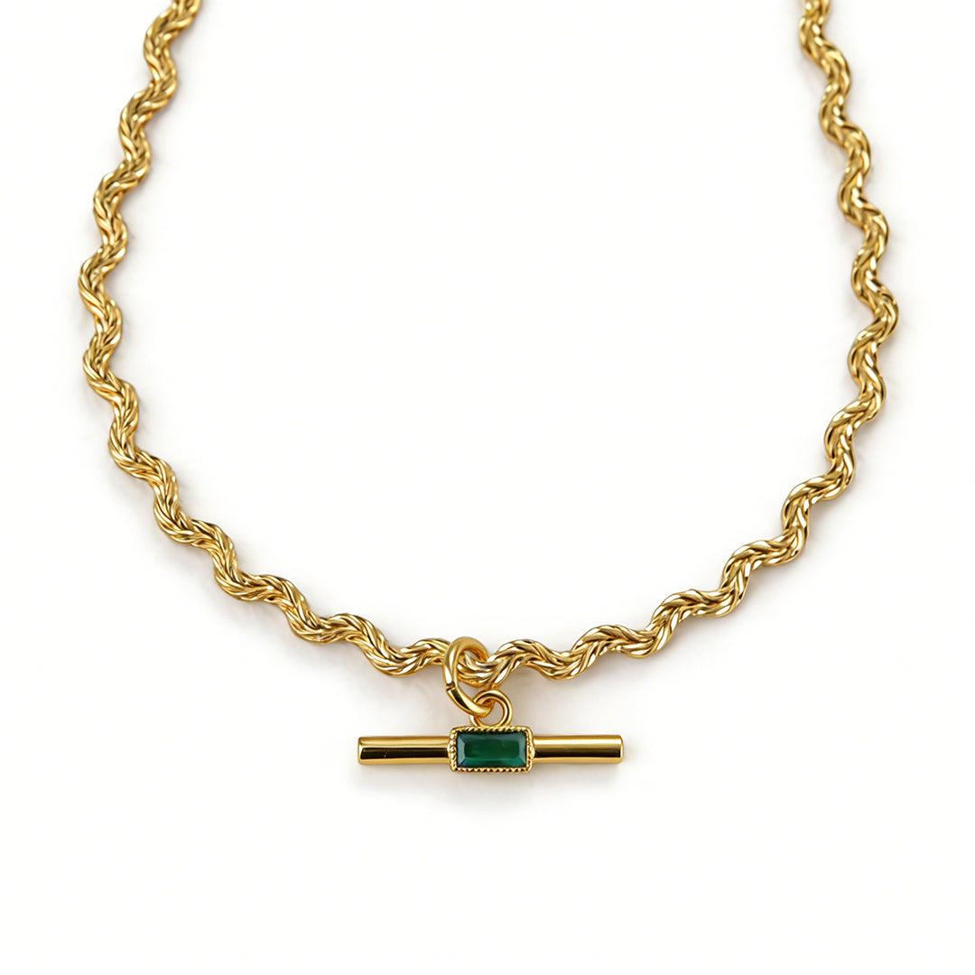 Ever P. emerald pendant necklace with a classic emerald-cut green crystal.