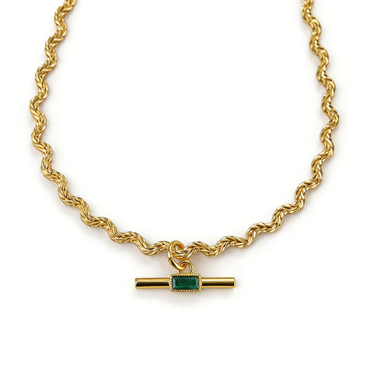 Ever P. emerald pendant necklace with a classic emerald-cut green crystal.