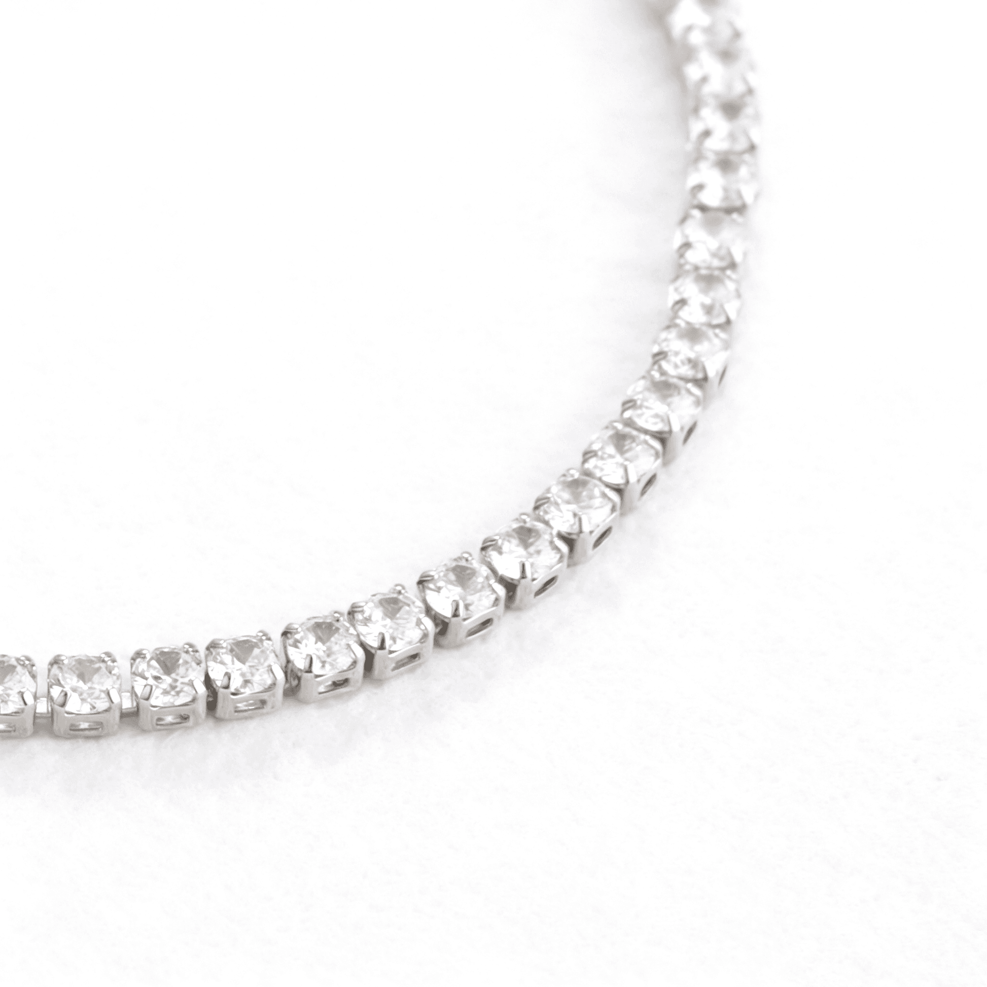 Close-up of the 19cm tennis bracelet showcasing the brilliant pavé-set zirconia stones and secure clasp.
