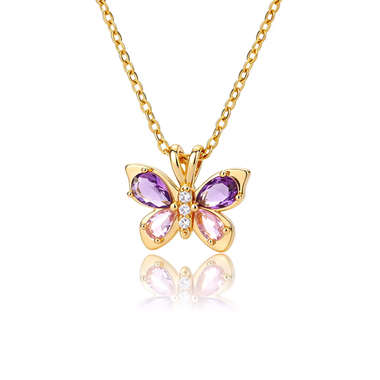 Gold-tone butterfly necklace with purple and pink wing accents and a delicate chain