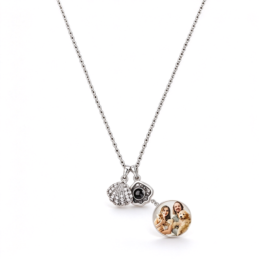Custom photo pendant necklace with seashell charms and a round personalized photo medallion on a white background.
