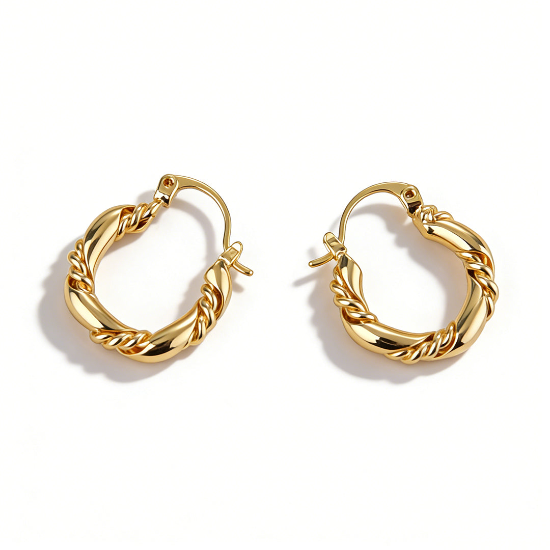 Ever P. gold hoop earrings with 18k gold plating, a durable and chic jewelry accessory.