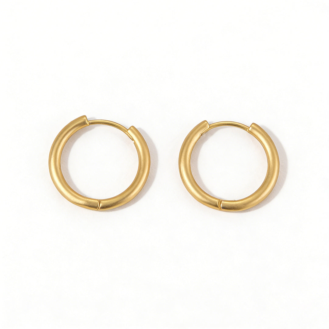 Ever P. gold hoop earrings for women with a unique organic molten texture.