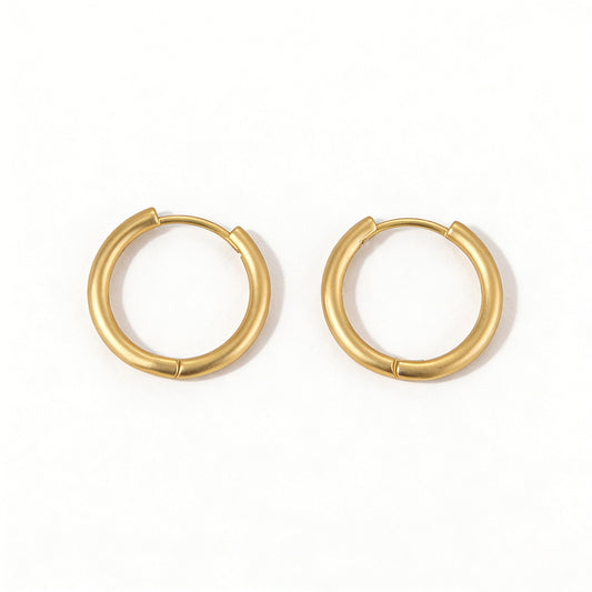 Ever P. gold hoop earrings for women with a unique organic molten texture.