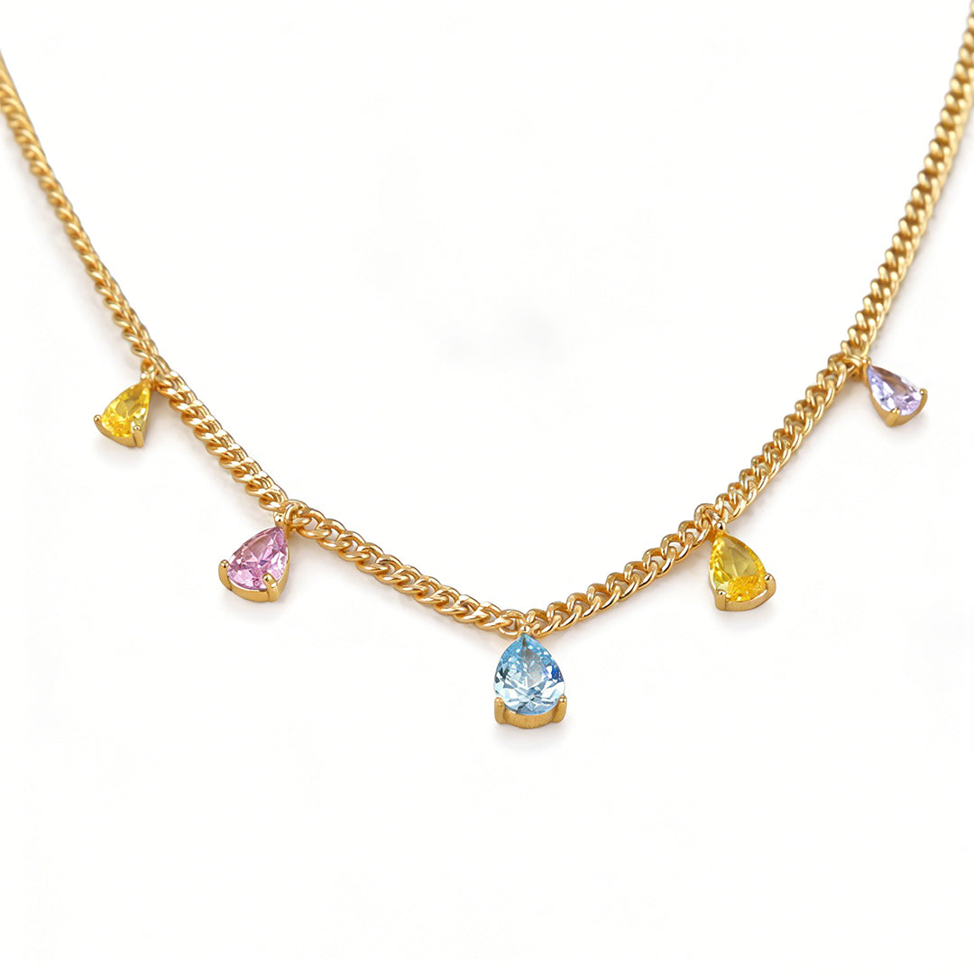 Ever P. gold pendant necklace with a rainbow cubic zirconia design.