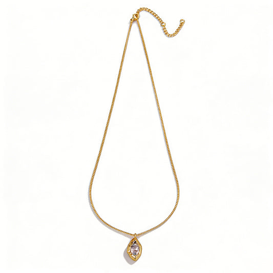 Ever P. gold pendant necklace with a brilliant teardrop halo cubic zirconia design.