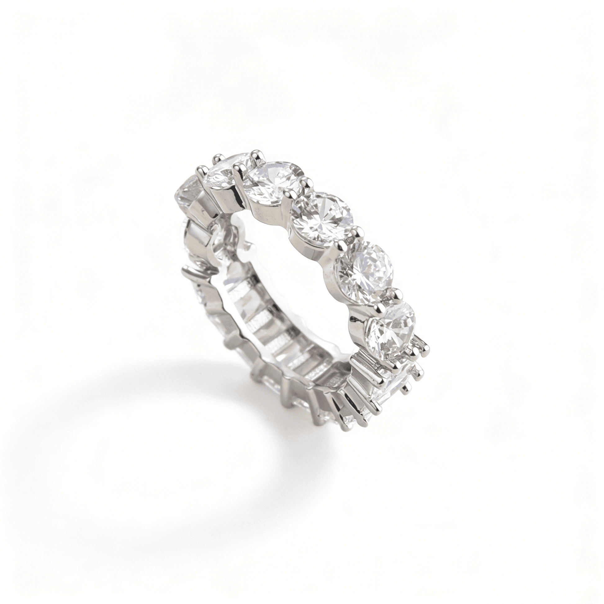 Macro view of the hand-set cubic zirconia on the Ever P. multi-cut eternity ring, showcasing professional craftsmanship and high-end aesthetics.