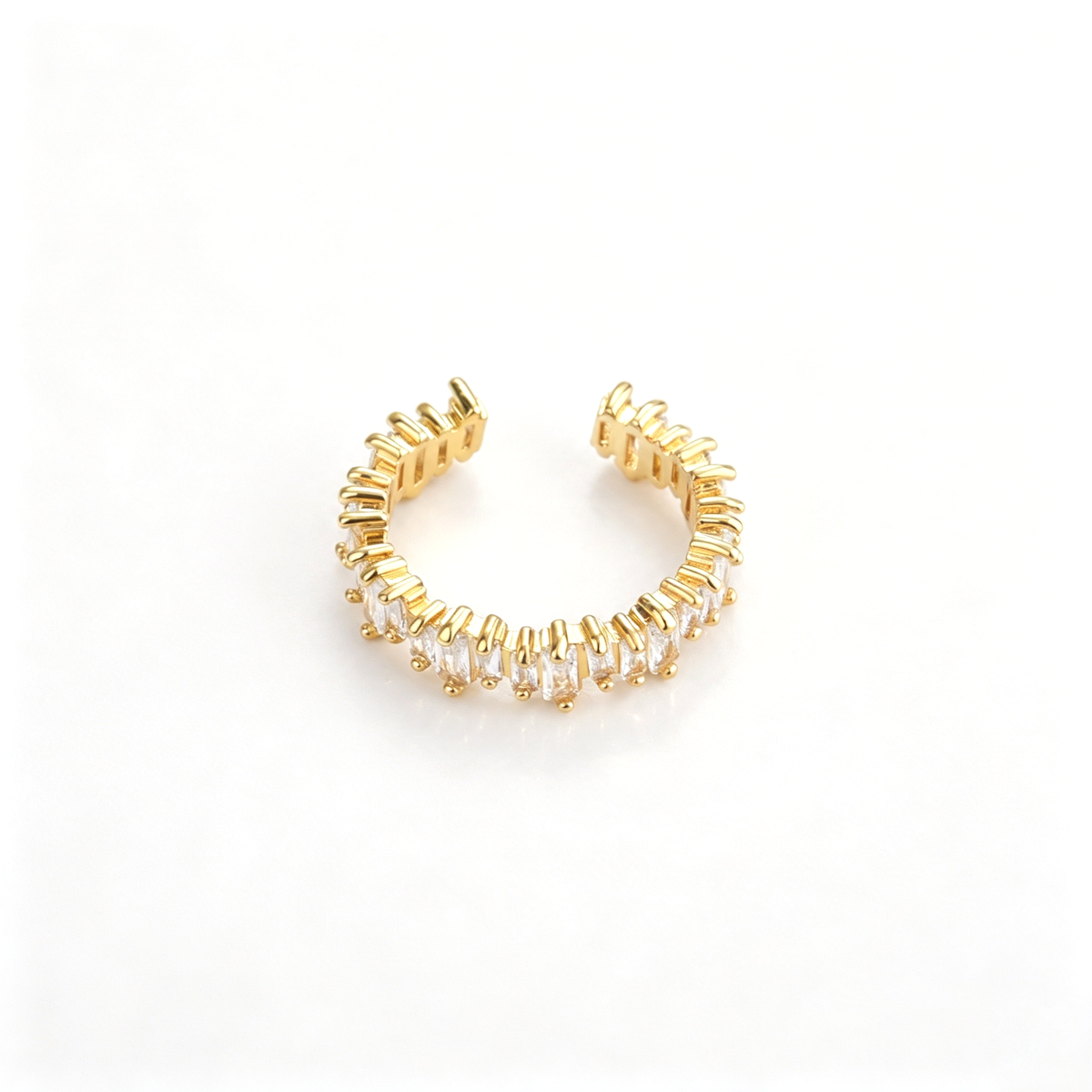 Open cuff bracelet in a front angled view showing the decorative curved details