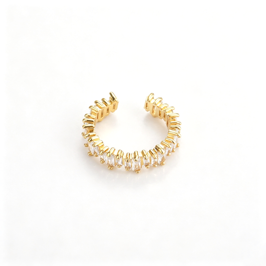 Open cuff bracelet in a front angled view showing the decorative curved details