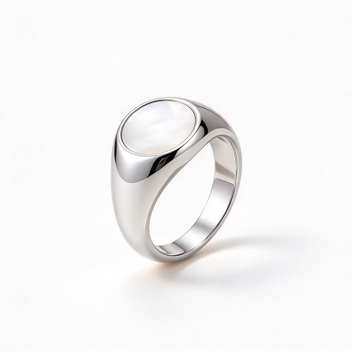 Oval face wide band statement ring shown from a three-quarter angle on a white background.
