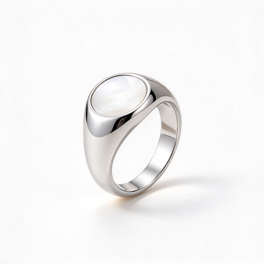 Oval face wide band statement ring shown from a three-quarter angle on a white background.
