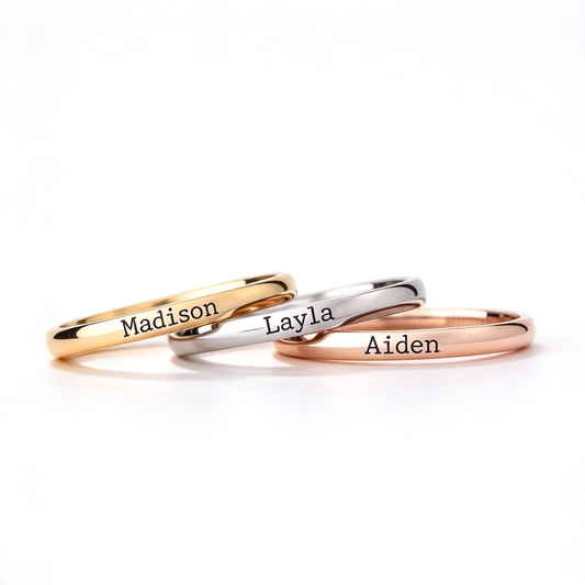 Personalized name rings in gold-tone, silver-tone, and rose-gold-tone with individual names