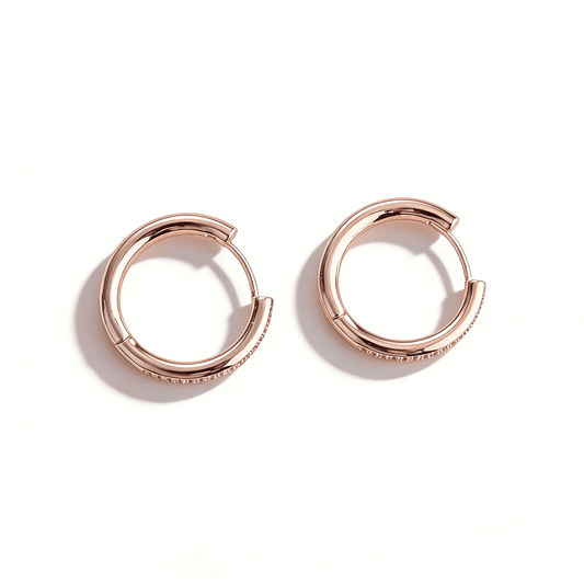 Front view of Ever P. rose gold hoop earrings featuring a full eternity pave setting of cubic zirconia.