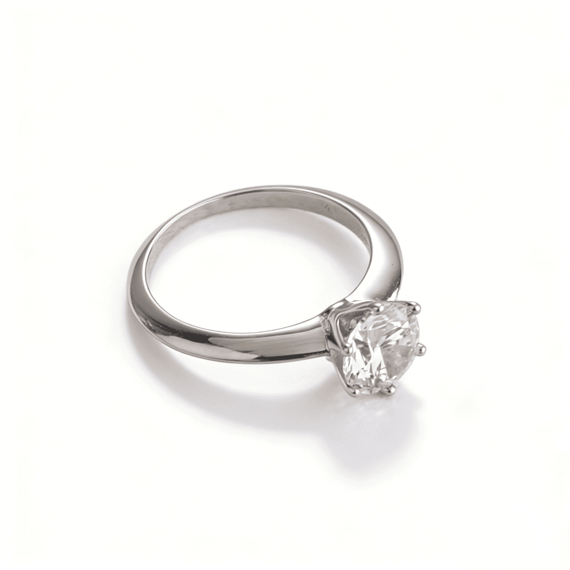 Side profile of Ever P. luxury rings, showcasing the brilliant fire of premium stones.