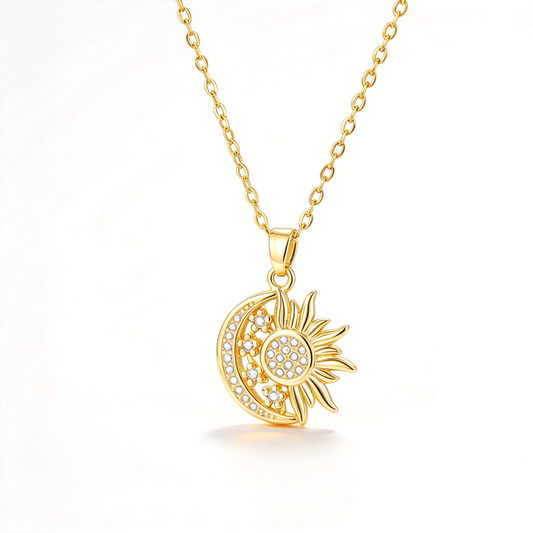 A sun and crescent moon pendant necklace with sparkling decorative details on a clean white background.
