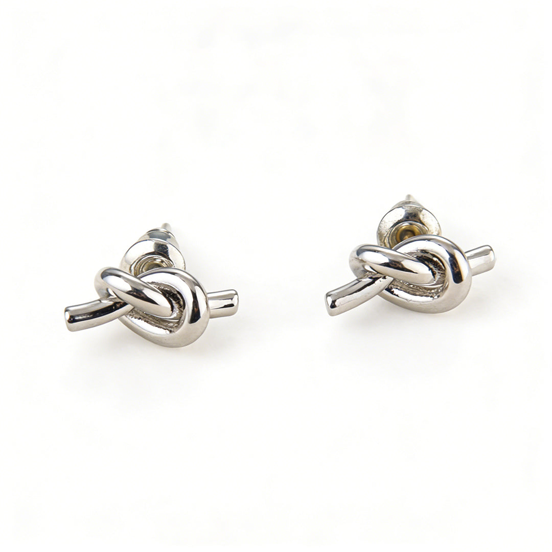 Ever P. twisted knot earrings, a symbol of connection and timeless minimalist elegance
