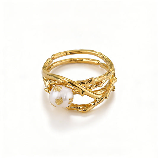 Ever P. wire wrapped rings for women, featuring a large natural pearl and vintage gold bird nest design.