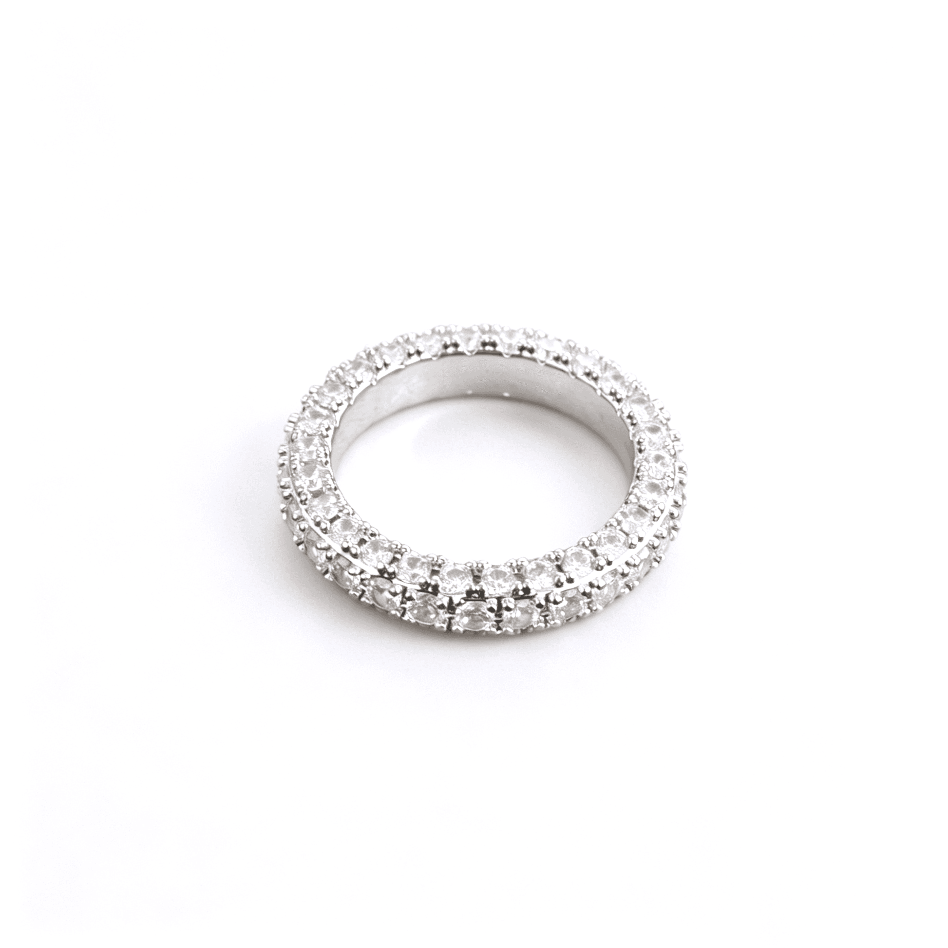 Detailed finger-wearing lifestyle shot showcasing the quiet luxury stacking potential of the sparkly pave ring.