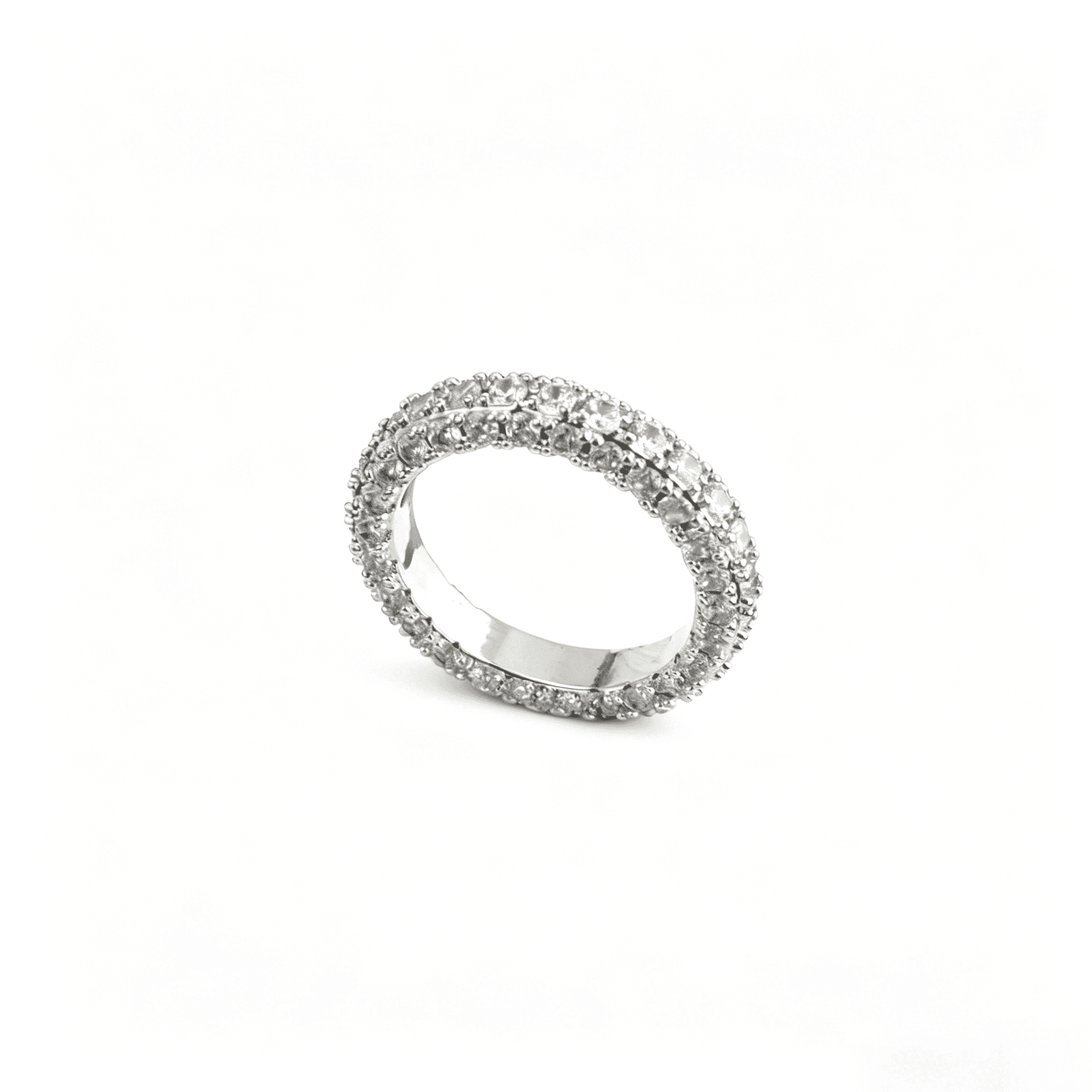 Studio display of the polished geometric eternity band, illustrating the seamless electroplating and premium setting.