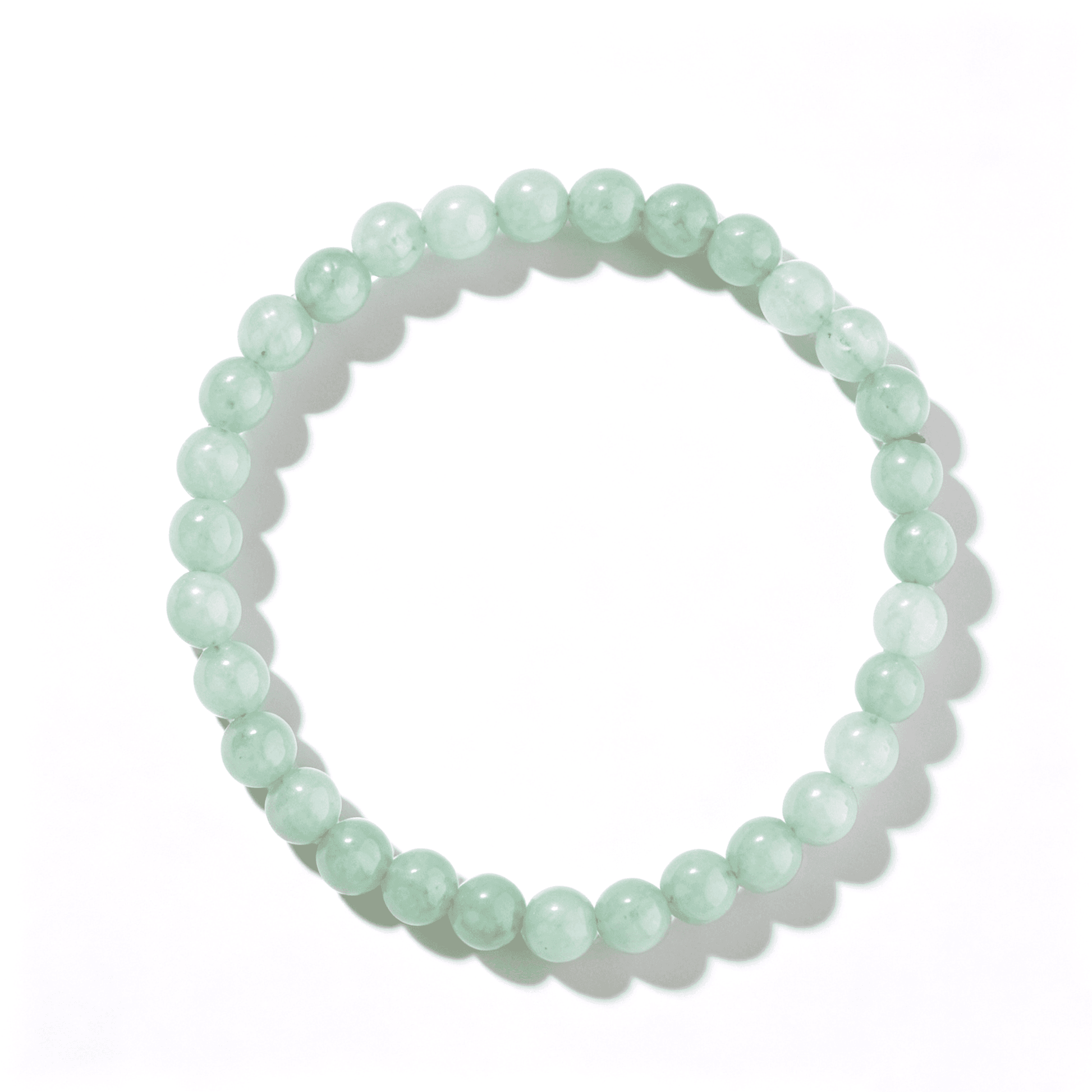 The circular symmetry of the Dew Green agate bracelet, reflecting Eastern balance.