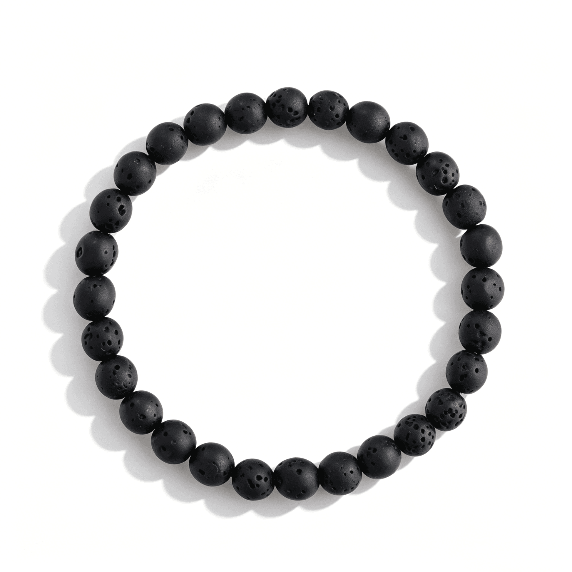 Top-down view showing the perfect circular alignment of the adjustable matte black crystal bracelet.