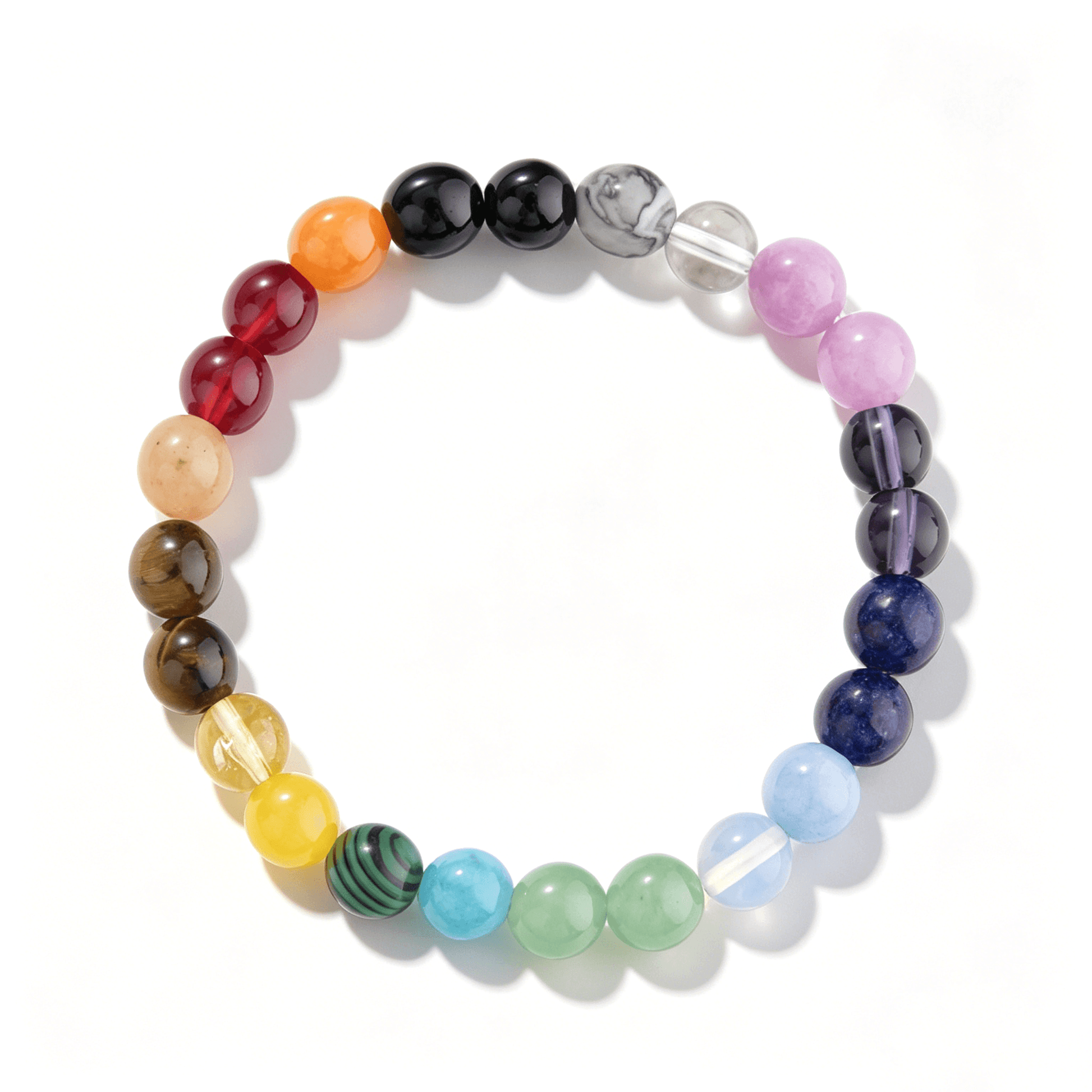 Detail of the adjustable 19.5cm gold-tone extension chain on the Ever P. rainbow strawberry quartz healing crystal bracelet