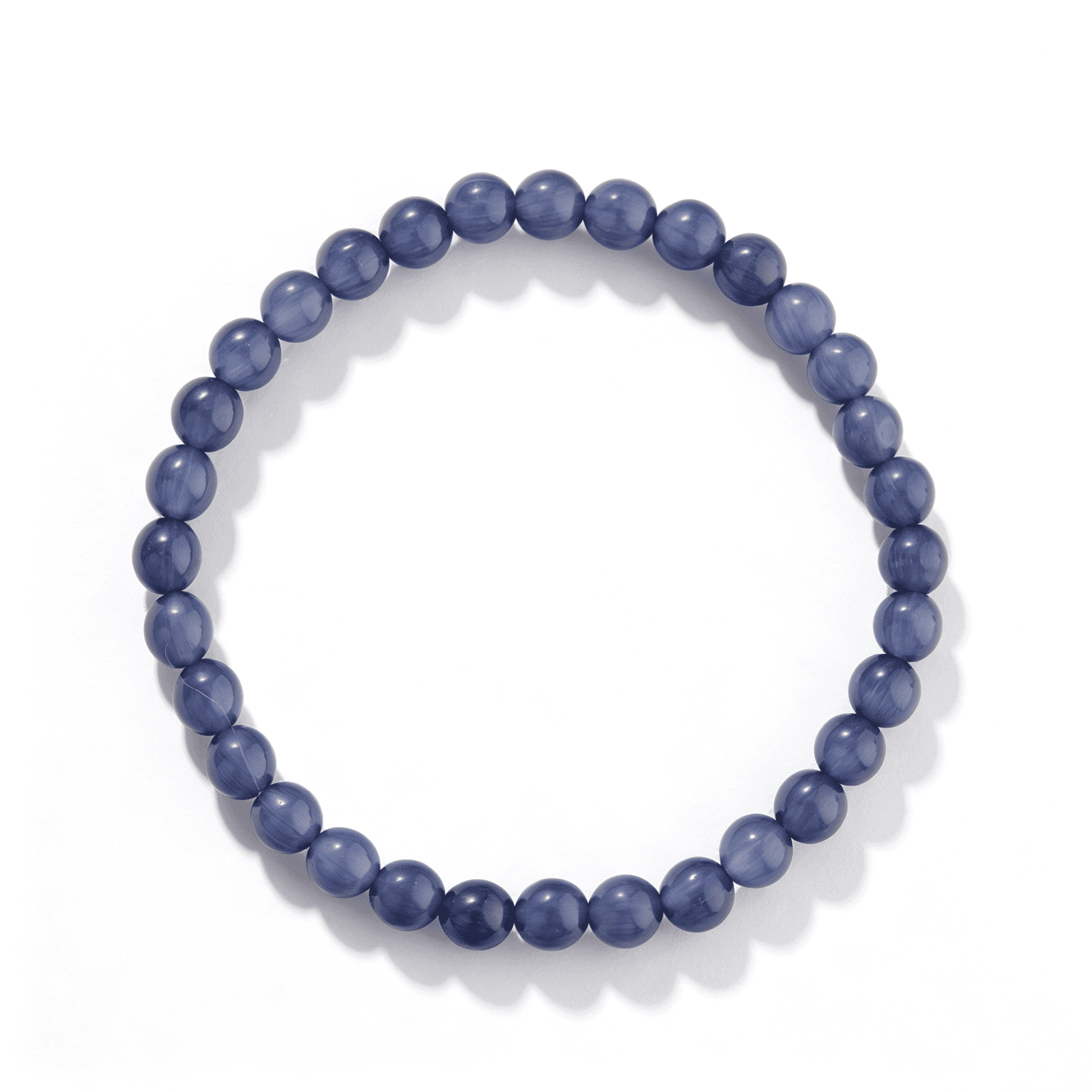 The circular symmetry of the adjustable violet agate bracelet, embodying Eastern Zen.
