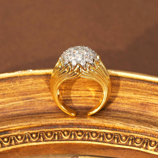 Close-up of the antique style cluster setting on an adjustable gold ring.