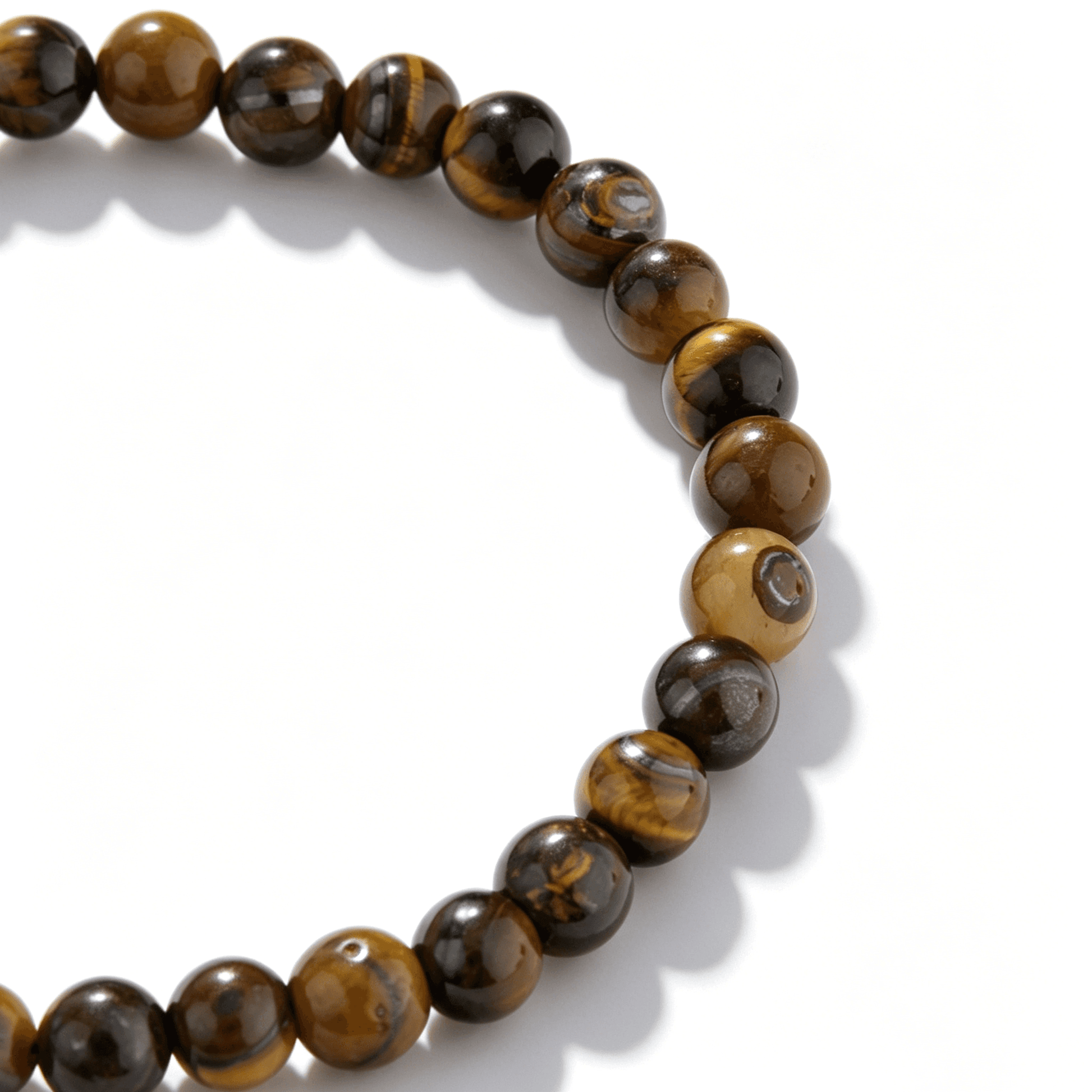 Close-up of Ever P. Brown Radiance bracelet showing the golden tiger eye chatoyancy.
