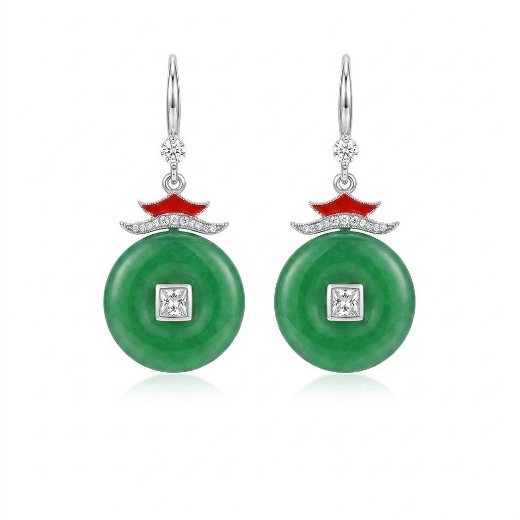 Ever P. Chinese jewelry featuring gold dangle earrings with a red donut amulet disc.