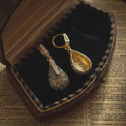 Close-up of the brilliant crystal cluster on Ever P. retro glam stud earrings.