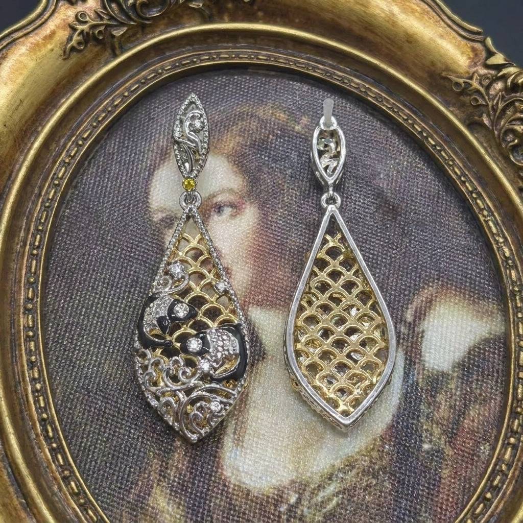 18K gold-plated filigree earrings by Ever P., showcasing the intricate teardrop design.