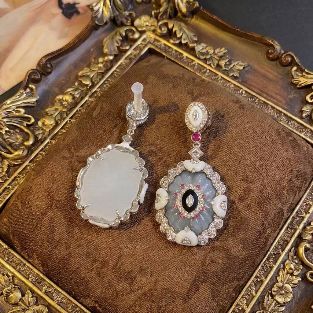 Scale view of the Ever P. vintage drop earrings, showcasing the 5.2cm sculptural length.