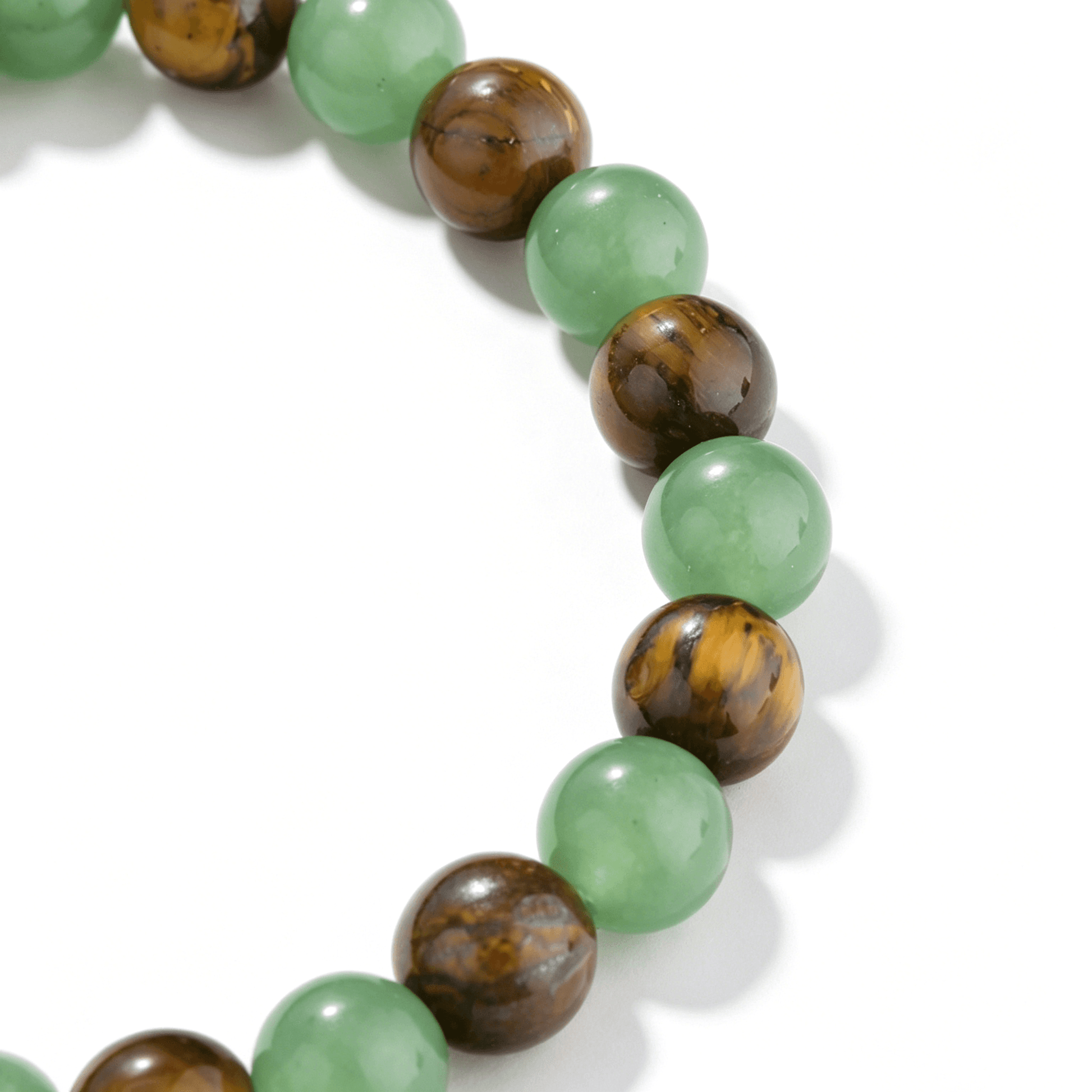 Side view display of the Ever P. natural gemstone bracelets crafted from rare earthy-toned strawberry quartz beads.