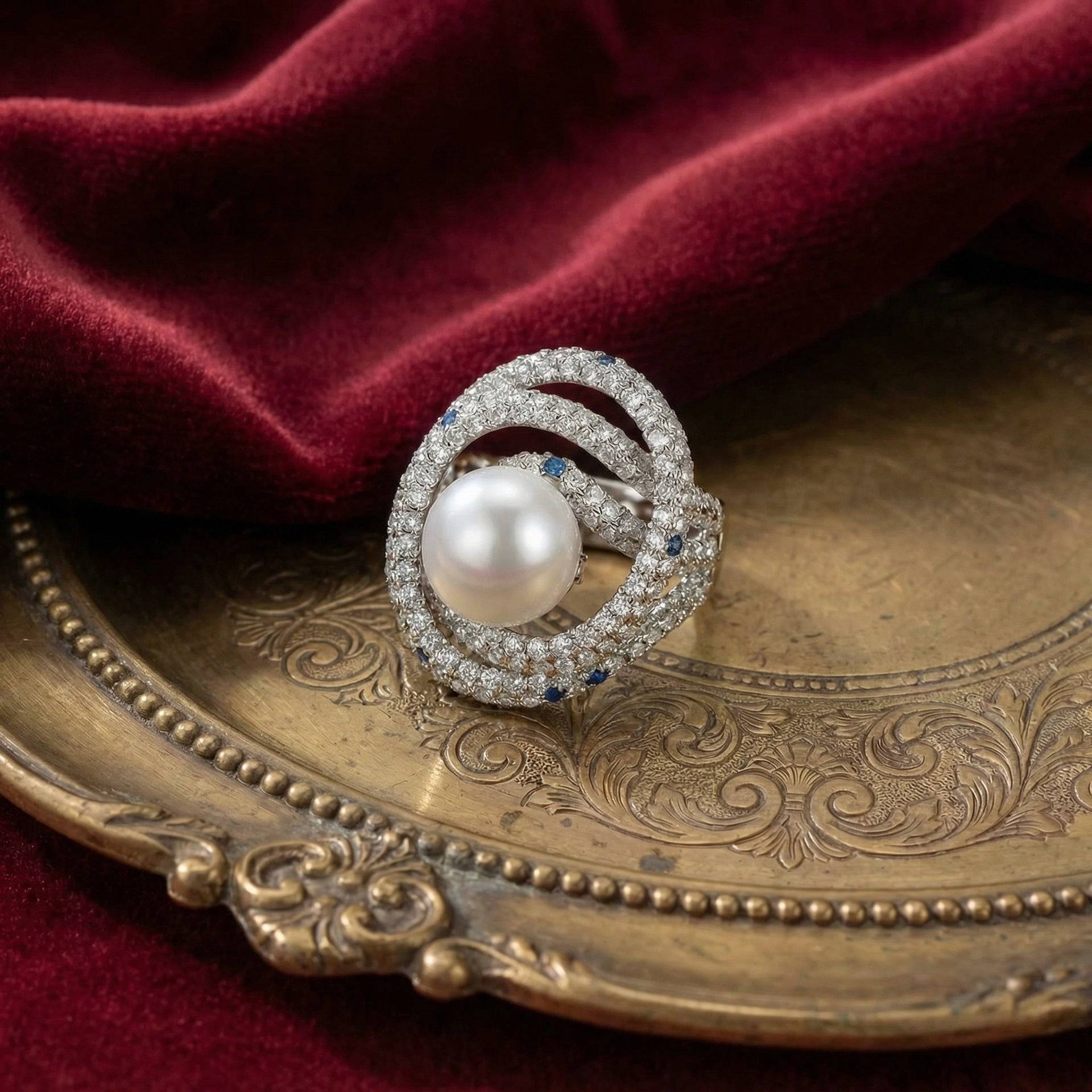 Full view of the tiered geometric pearl statement ring with a vintage aesthetic.
