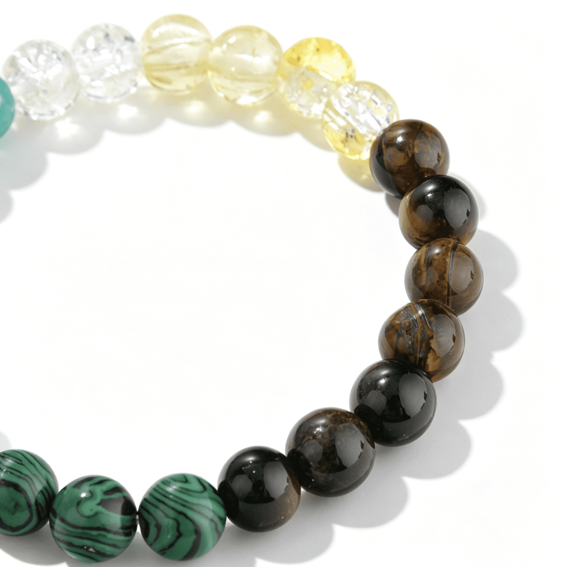 A collection of Ever P. gemstone bracelets featuring the unique mossy green inclusions of authentic natural strawberry quartz.
