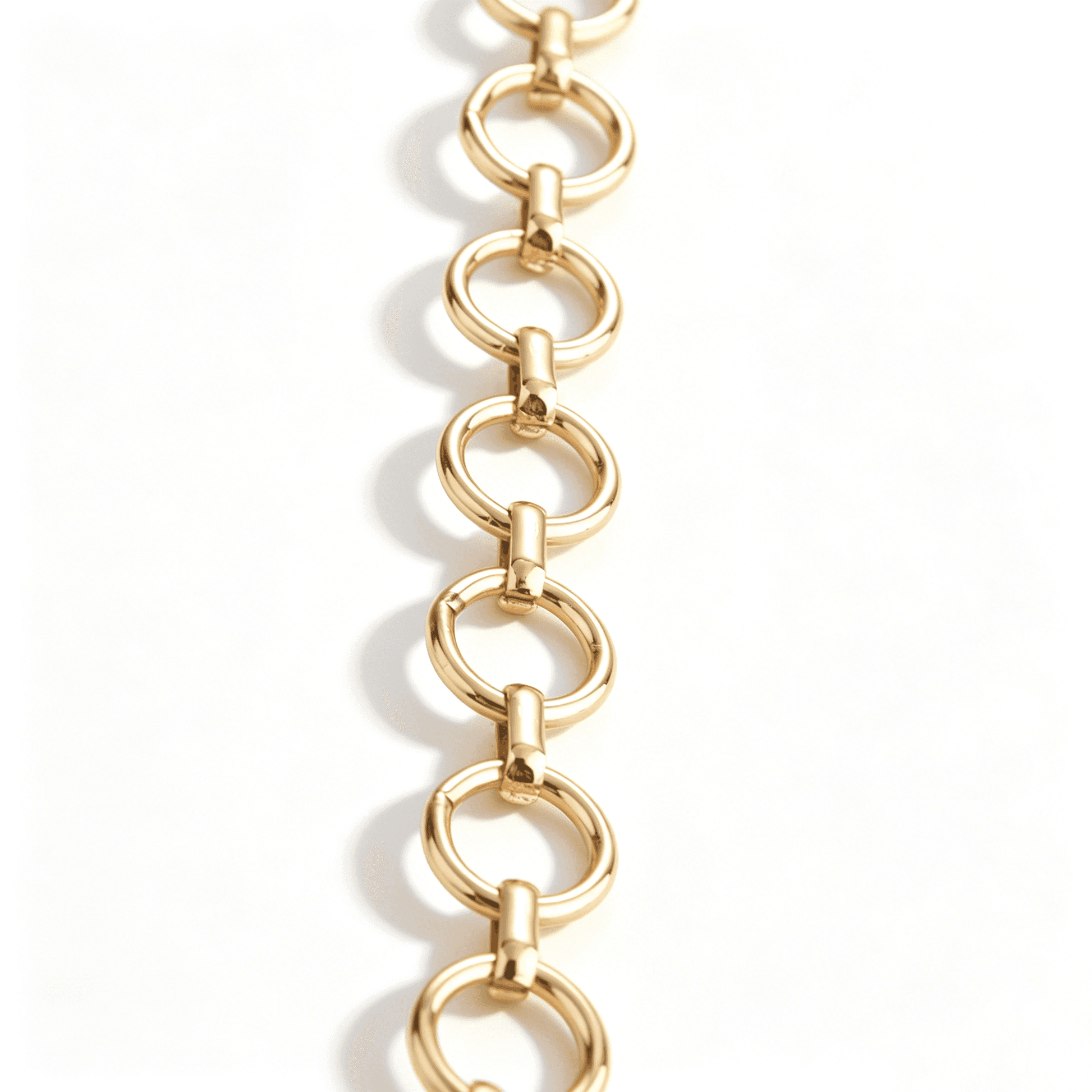 Close-up of the sculptural hollow geometric heart on the Ever P. gold heart necklace for women.
