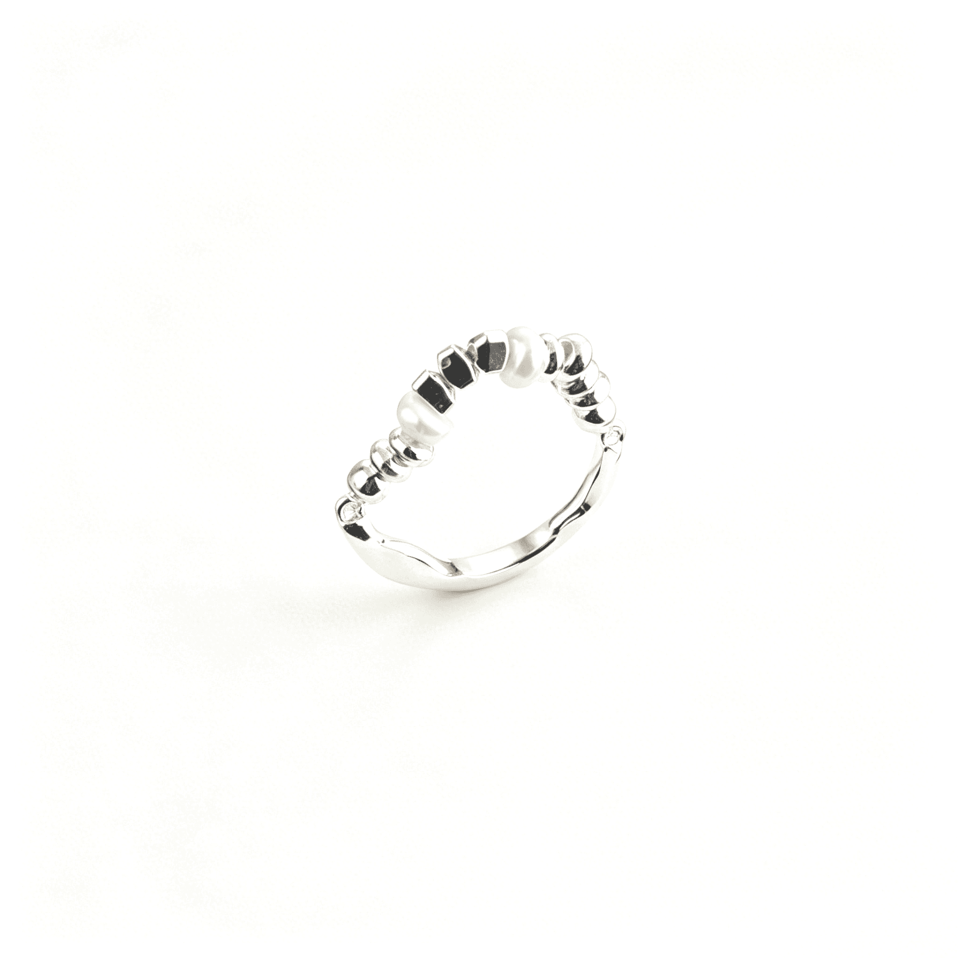 Elegant studio product display of the deconstructed pearl engagement rings alternative, perfect as a luxury fashion gift.