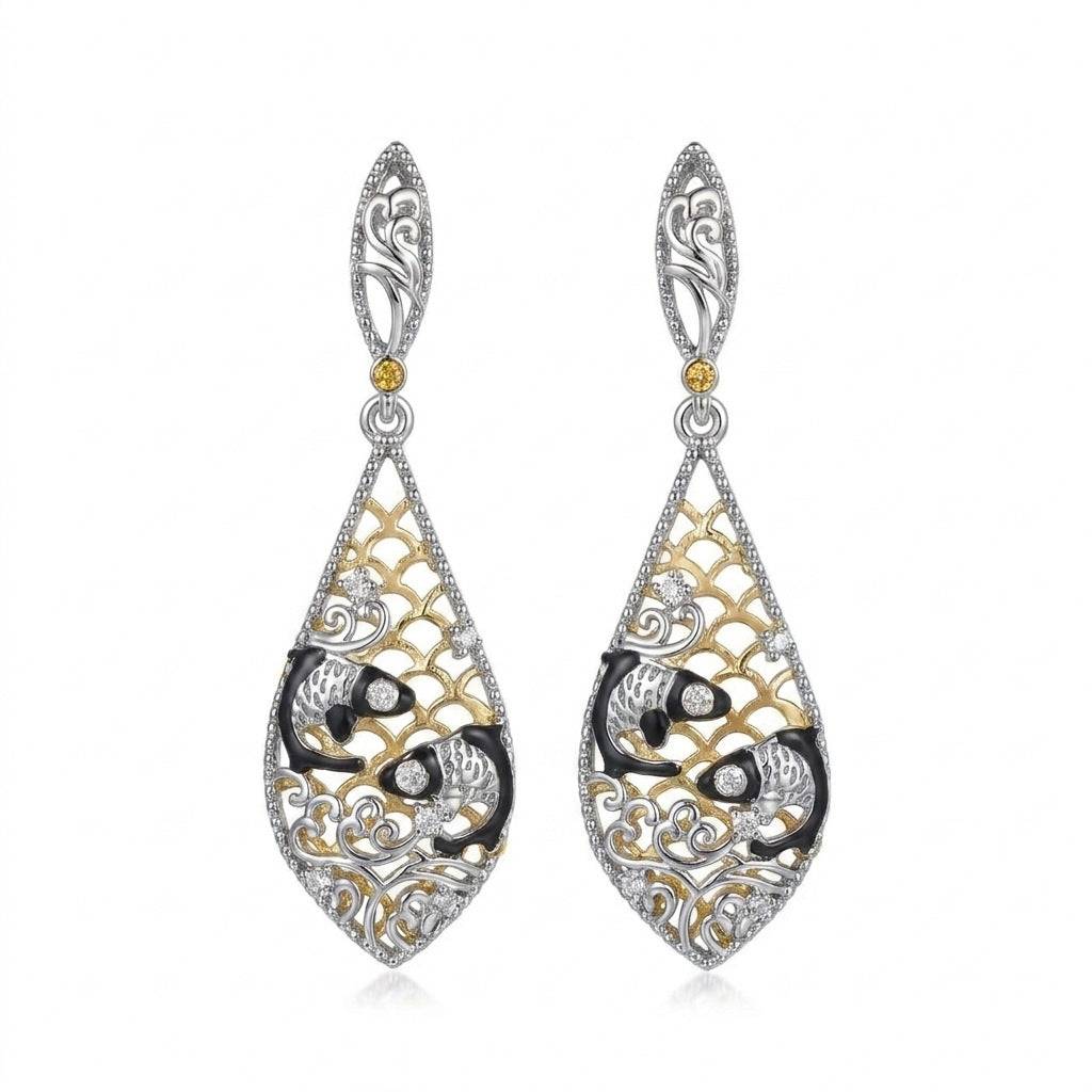 Ever P. Koi fish filigree earrings in a gold teardrop drop silhouette.