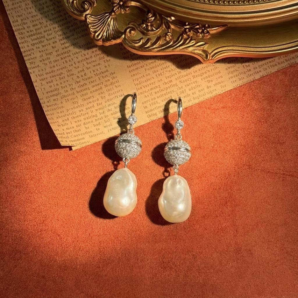 Elegant 5.9cm long pearl drop earrings by Ever P., showcasing the contrast between crystal and pearl.
