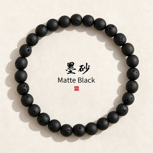 "Matte Black" (墨砂) collection cover featuring the black handmade agate bracelet.