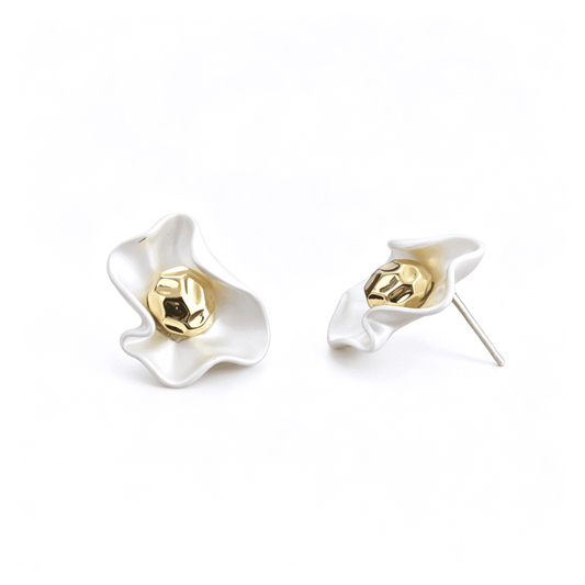 Front view of Ever P. abstract flower stud earrings, showing the matte white outer petal and hammered gold center.