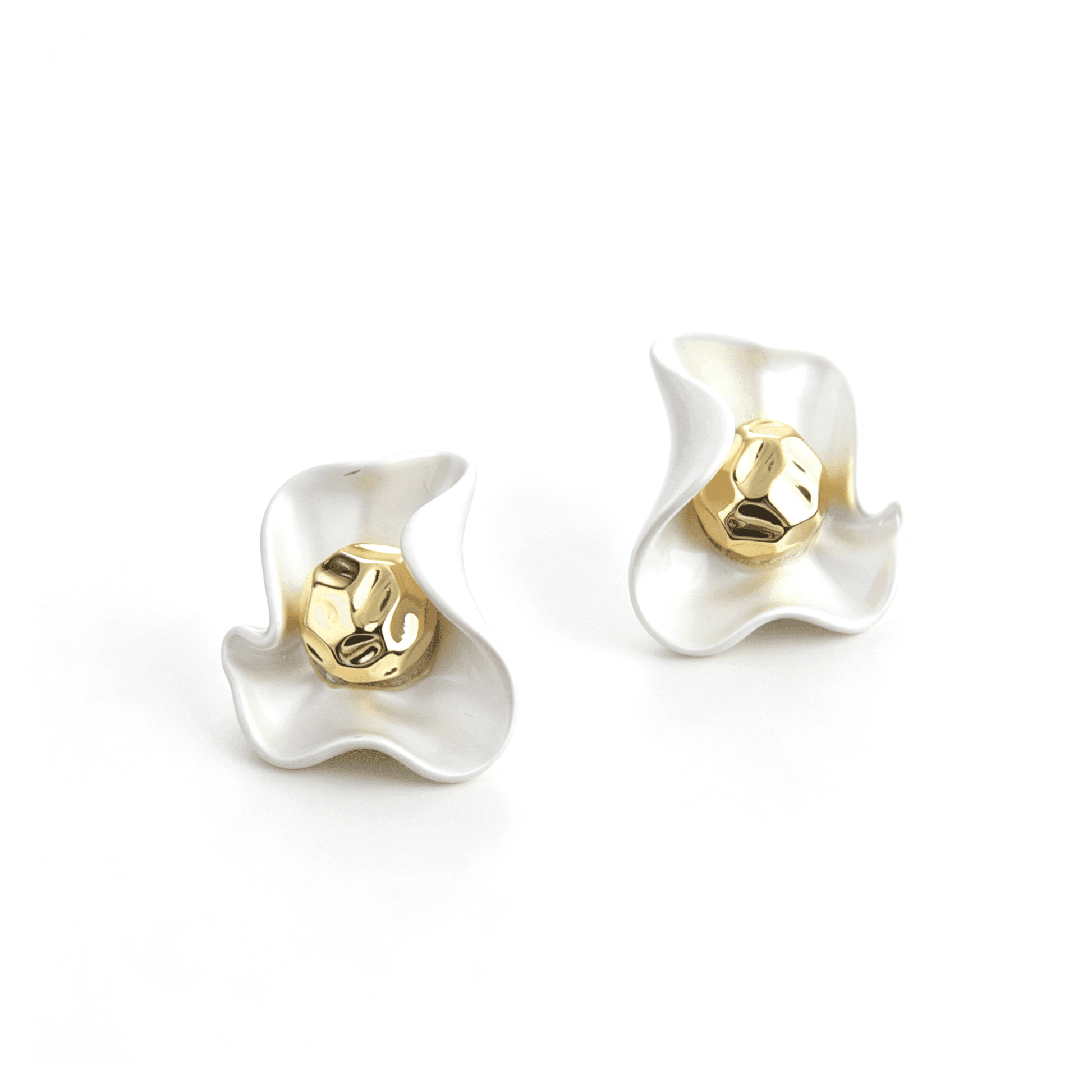 Studio product display highlighting the organic flowing curves of the two-tone mixed finish flower studs.