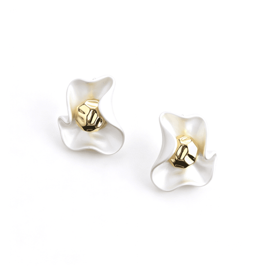 Close-up texture view of the vintage style matte gold earrings, showcasing the unique molten metal artistic design.