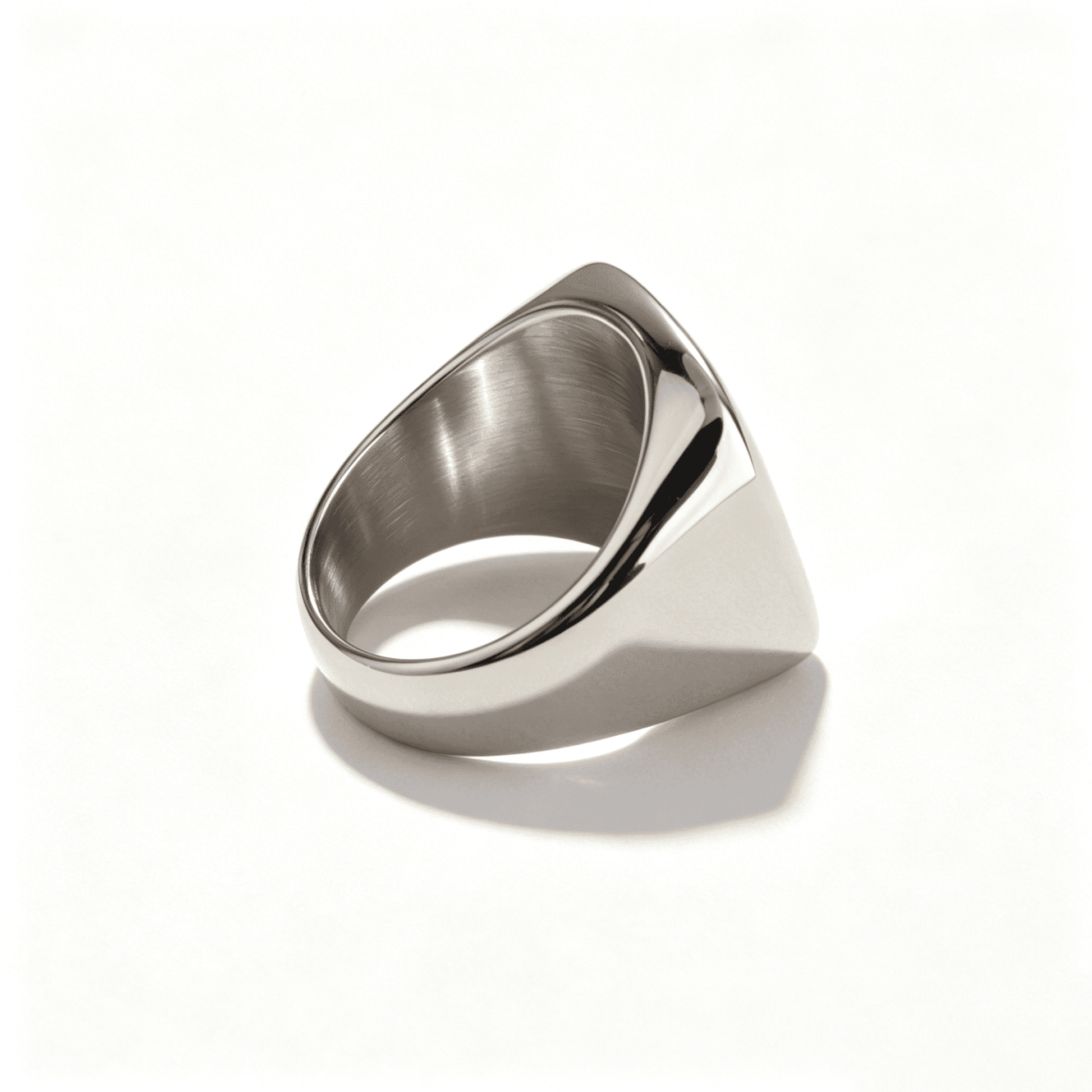 Ever P. minimalist silver square signet ring with a 20mm high-polish mirror finish face.