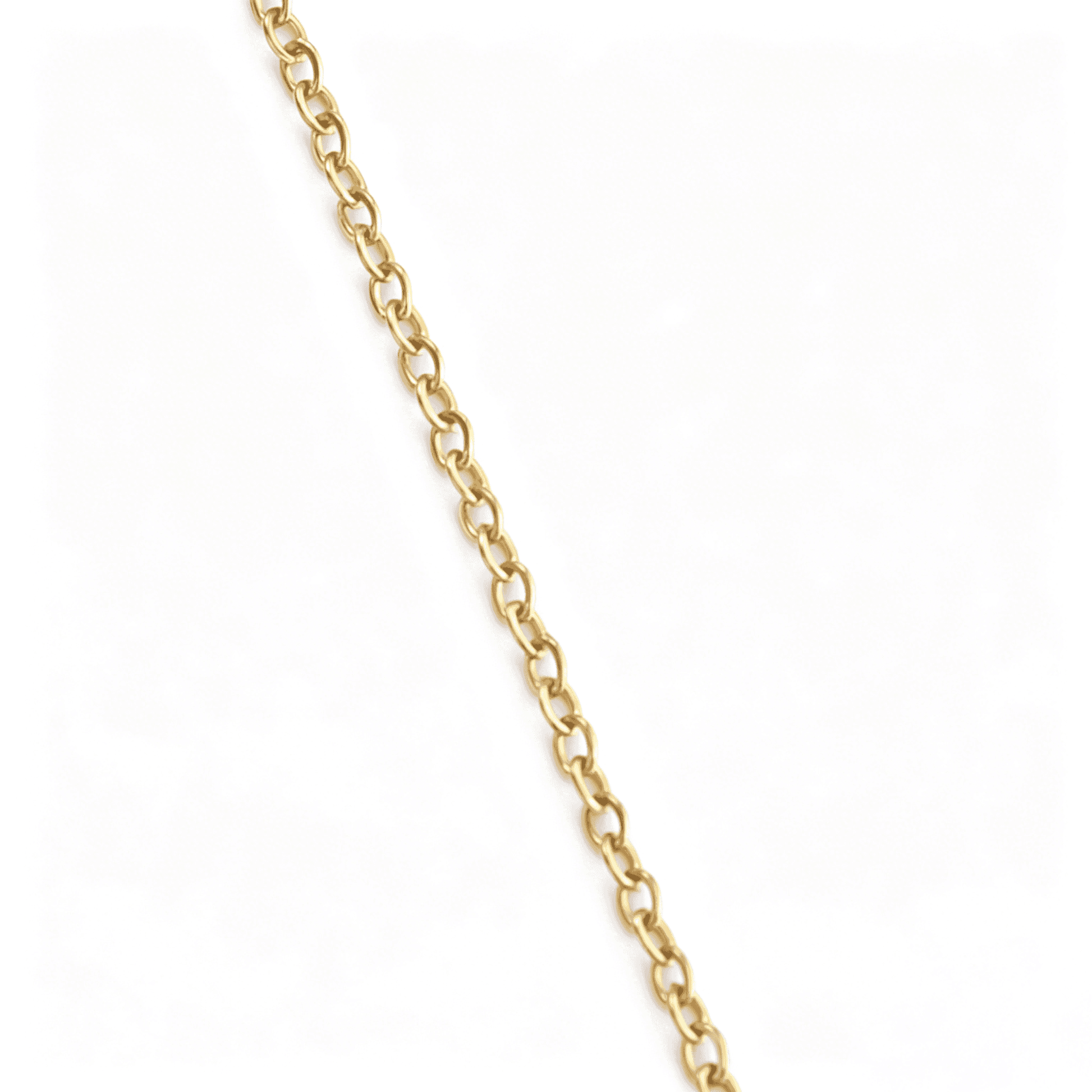 Profile perspective highlighting the flawless artisan carving of the layered sunflower gemstone charm.